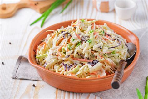 quick-and-easy-creamy-coleslaw-recipe-the-spruce image