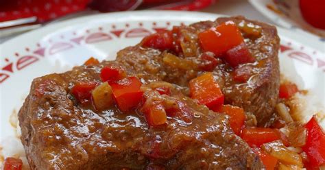 smothered-swiss-steak-recipe-hot-eats-and-cool-reads image