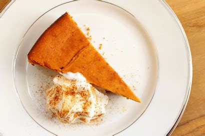 pumpkin-cheesecake-with-ginger-graham-cracker-crust image