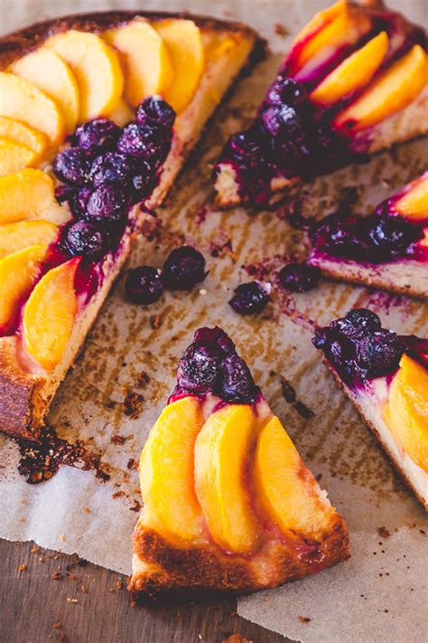 peach-and-blueberry-breakfast-pizza-recipe-delicious-everyday image