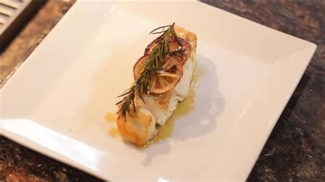 baked-halibut-using-olive-oil-rosemary-garlic image