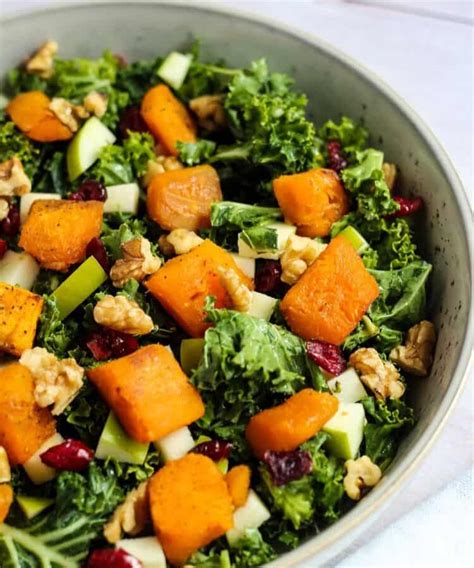 kale-salad-with-cranberries-and-butternut-squash image