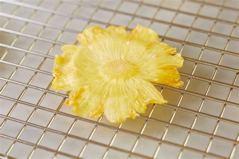 how-to-make-dried-pineapple-flowers-kitchn image