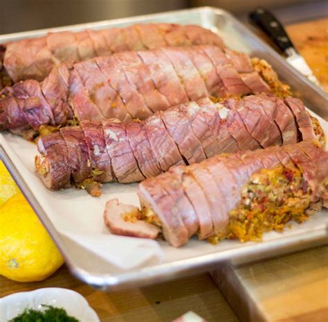 roast-pork-stuffed-with-sun-dried-tomatoes-and-olives image