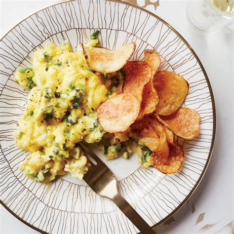 scallion-scrambled-eggs-with-potato-chips-food-wine image