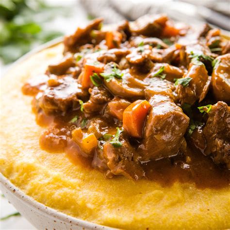 braised-beef-and-mushrooms-with-polenta-the-busy image