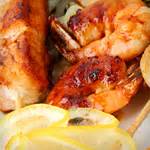 lemony-chicken-shrimp-and-vegetable-kebabs image