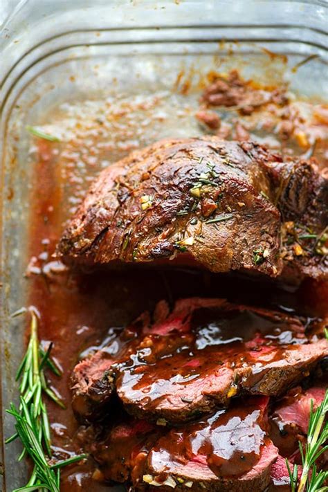 rosemary-garlic-butter-beef-tenderloin-with-red-wine image