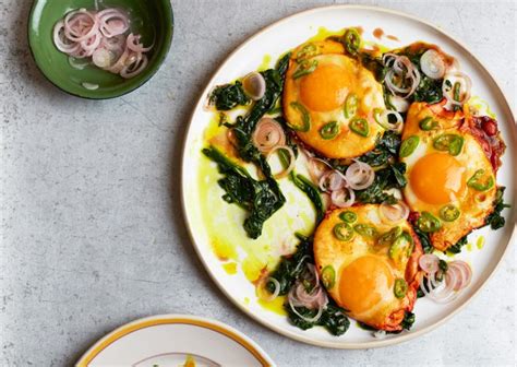 turmeric-fried-eggs-with-tamarind-dressing-ottolenghi image