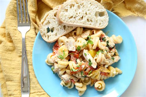 baked-chicken-feta-tomato-pasta-real-life-dinner image