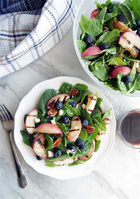 grilled-peach-blueberry-spinach-salad-with-honey image