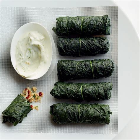 stuffed-kale-with-bulgur-tabbouleh-and-lime-yogurt-dip image