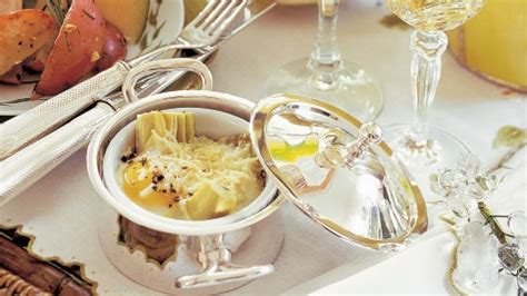 baked-eggs-with-artichokes-and-parmesan-recipe-bon image
