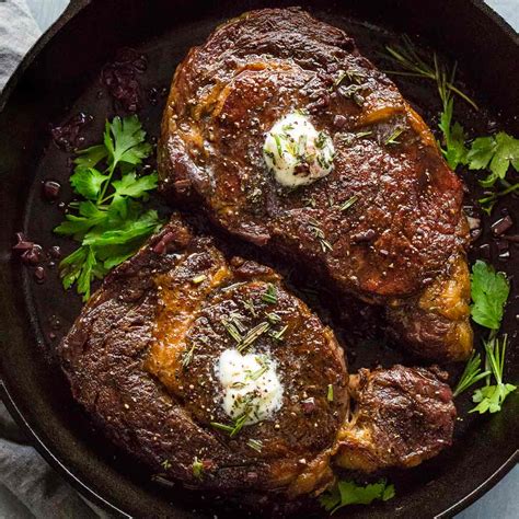 ribeye-steaks-with-red-wine-reduction-sauce image