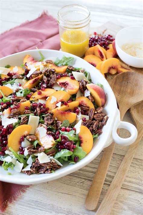 arugula-peach-salad-with-pomegranate-and-pecans image