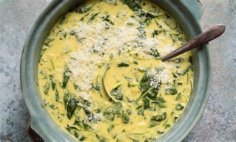 spicy-red-lentil-soup-with-coconut-milk-and-spinach image