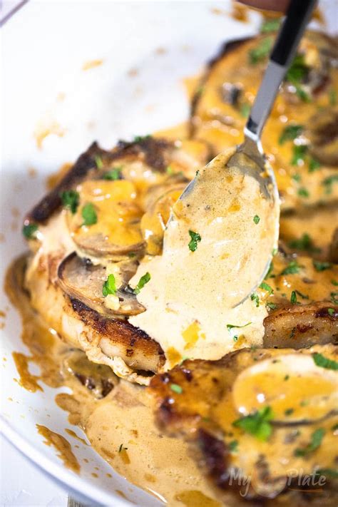 pork-chops-with-creamy-garlic-mushroom-sauce image