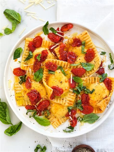 cheese-ravioli-with-blistered-cherry-tomato-sauce image