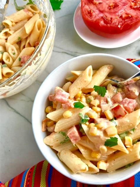 mexican-corn-pasta-salad-with-tomatoes-talking-meals image