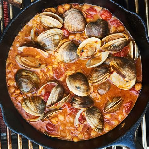 chile-lime-clams-with-tomatoes-and-grilled-bread image