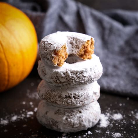 pumpkin-spice-baked-donuts-powdered-sugar-donuts image