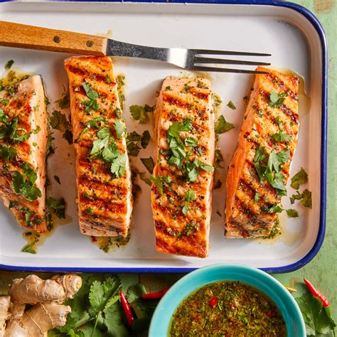 grilled-salmon-with-cilantro-ginger-sauce-eatingwell image