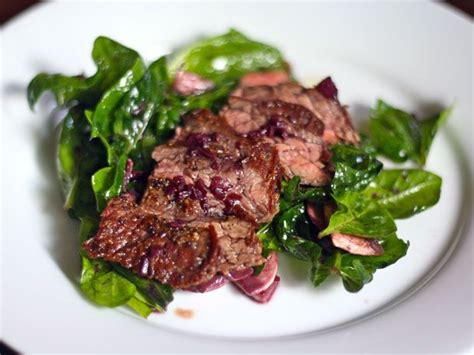 eric-riperts-seared-skirt-steak-and-spinach-salad-with image
