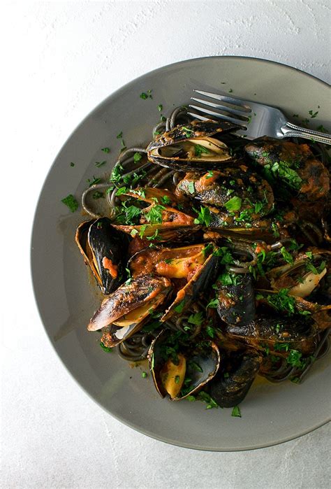 squid-ink-pasta-with-mussels-recipe-kitchen-swagger image
