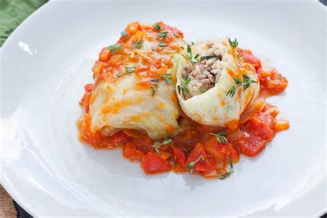 stuffed-cabbage-rolls-with-white-rice-beef-tomato image