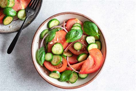 cucumber-tomato-and-basil-salad-recipe-the-spruce image