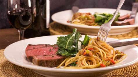 sliced-steak-and-spaghetti-with-pepper-sauce image