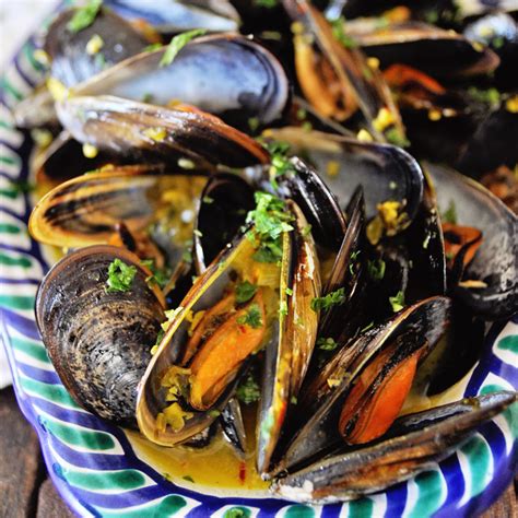 steamed-mussels-with-garlic-saffron-sauce-spain-on-a image