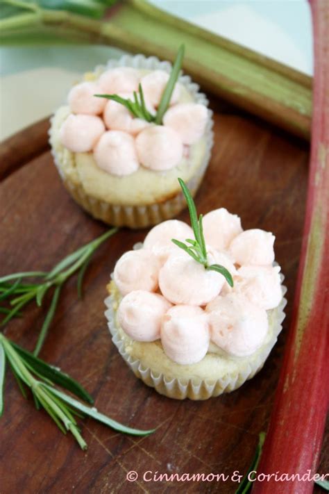 rhubarb-cupcakes-with-white-chocolate-rosemary image