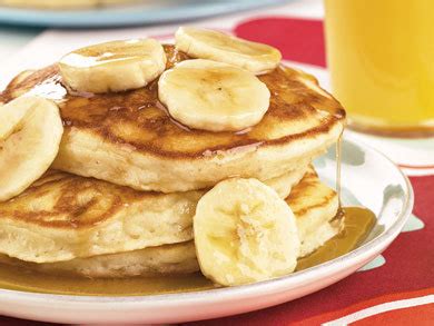 banana-pancakes-with-golden-banana-syrup image