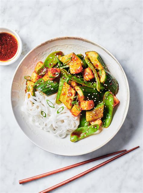 fried-tofu-bowl-with-green-vegetables-and-rice-noodles image