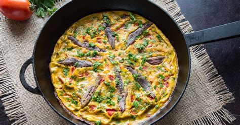 baked-anchovy-frittata-with-tomatoes-italian image