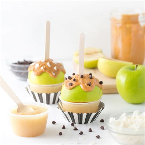 peanut-butter-candy-apples-recipe-eatingwell image