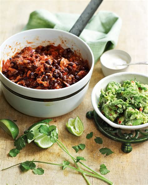 chipotle-black-bean-chilli-with-guacamole-delicious image