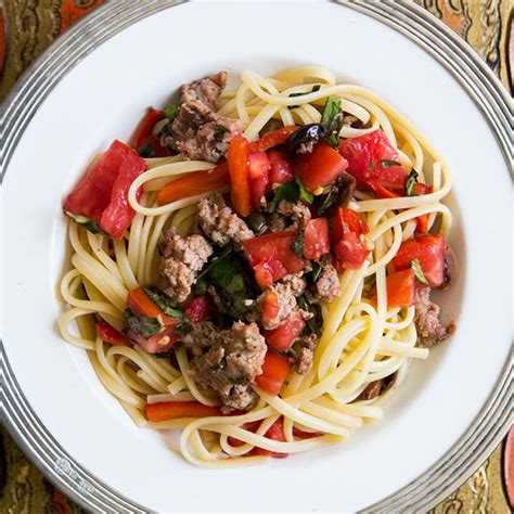 pasta-with-sausage-tomatoes-and-roasted-peppers image