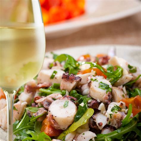 grilled-octopus-with-celery-and-cannellini-bean-salad image