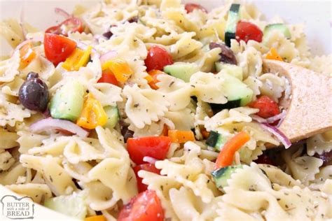 greek-pasta-salad-butter-with-a-side-of-bread image