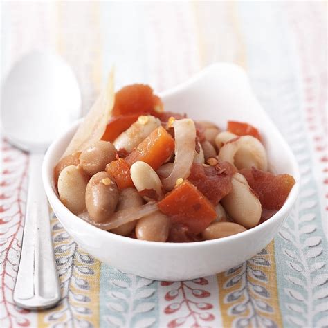 saucy-beans-with-tomatoes-recipe-eatingwell image