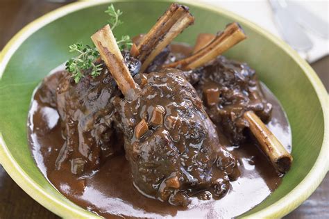 lamb-shanks-braised-in-red-wine-recipe-the-spruce image