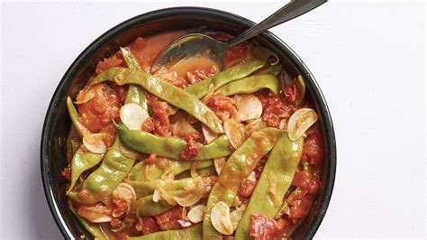 braised-romano-beans-with-garlic-and-tomatoes image