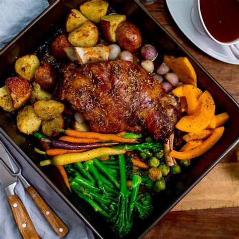slow-roast-shoulder-of-welsh-lamb-with-vegetables-and-cider image
