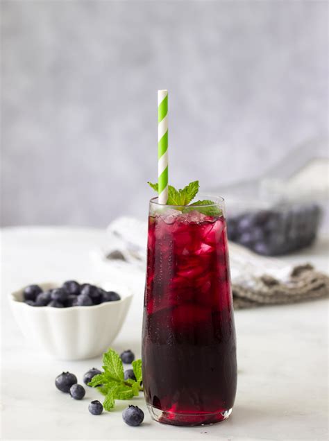 blueberry-iced-tea-with-lemon-and-a-hint-of-mint-whisk-it-real image