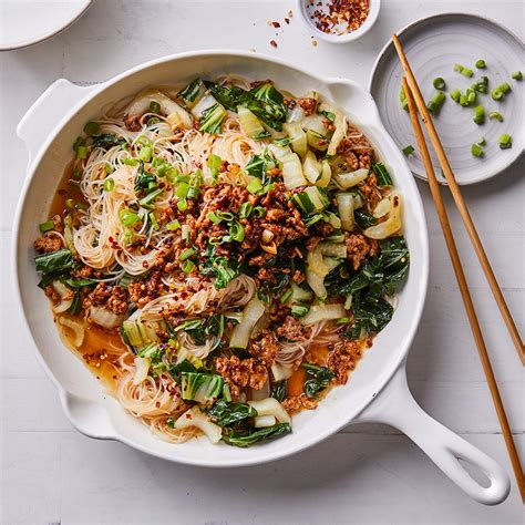 spicy-noodles-with-pork-scallions-bok-choy-eatingwell image