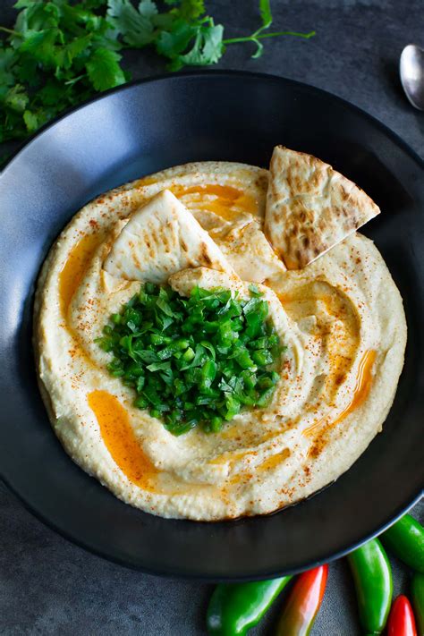 spicy-hummus-with-jalapeo-salsa-peas-and-crayons image