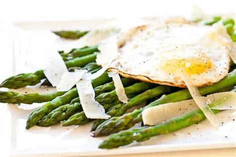 asparagus-with-fried-egg-and-parmesan-cheese-steamy image