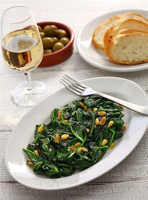 mediterranean-spinach-with-pine-nuts-and-raisins image